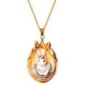 Vintage gold necklace featuring a classic rabbit pendant with blue jacket and small crystals - Gold Relief Rabbit Vintage Necklace