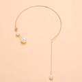 Minimalist gold choker necklace featuring elegant white pearls and a delicate tassel chain - Rose Gold Tone