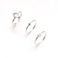 Three-piece set of vintage silver geometric rings featuring heart, star, and fish knot charms - One Size / Antique Silver