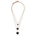 Close-up of triple-layered gold necklaces with black heart pendants and crystal edges - Gold Necklace (Black Heart Pendant) / Black