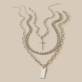 Multilayer silver chain necklace set featuring cross pendant and ruler engraved metal tag - Silver