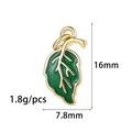 Detail of green enamel leaf pendant showing 16mm height and 7.8mm width measurements - Green Leaf (ZX202)