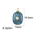 Blue oval natural stone pendant with cubic zirconia and gold loop, 19.3mm by 13mm size - Blue Ore Texture Oval Style (ZX314) / 14K Gold