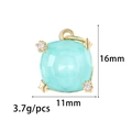 Detalle de colgante ovalado de circón verde menta con engaste dorado y pequeñas piedras - Estilo Estrella Cuadrada (ZX099) / Azul