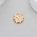 14K gold circular coin pendant with letter T featuring a hammer texture and beaded edge - Letter T (P24278-T)