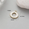 Macro detail of 15mm gold round pendant with white enamel inlay and size labels - O (14K Gold H-12344)