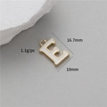 Detail view of a gold-plated letter E pendant with white enamel finish and dimensions - E (14K Gold H-12334)