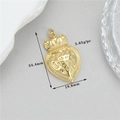 Detail view of gold heart crown pendant with dimensions 34.4mm by 19.8mm and 5.65g weight - Crown Heart (h-12565)