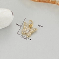 Detailed macro view of 16mm gold butterfly pendant with cubic zirconia measurements - Gold Style 9