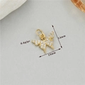 Macro detail of gold butterfly pendant with zircons showing dimensions 13mm by 14mm - Gold Style 8