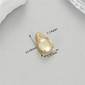 Macro shot of 14K gold plated jewelry charm with moonstone and size measurements - Light Yellow Cat Eye Stone Teardrop Style (h-12584)