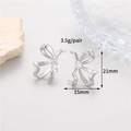 Dettaglio macro di pendenti per orecchini a fiocco con zirconi e dimensioni - Oro Palladio (CBK1604)