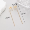 Detailed view of long tassel bow earrings with pearls, zircons and gold weave - 14K Gold Plated Woven Bowknot Tassel Style (F0901091)