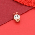 Macro shot of gold-plated zodiac rabbit bead with red enamel and Fu character detail - Rabbit Style (D2114-Rabbit)