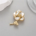 Close-up of elegant rose brooch featuring white mother of pearl petals and gold metal stem - Rose (XZ-199)