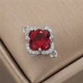 Macro shot of silver flower pendant with central red zircon and double ring connectors - Palladium Four-Leaf Clover Rose Red Zircon(H-10045)