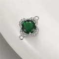 Detailed macro view of silver four-leaf clover charm with emerald green zircon stone - Palladium Four-Leaf Clover Green Zircon(H-10045)