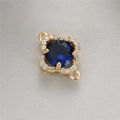 Detail of four-leaf clover pendant with blue sapphire-like stone and white zircons - 14K Gold Four-Leaf Clover Blue Zircon(H-10045)