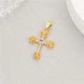 Detail of 14K gold cross pendant with rose-shaped ends and a heart-shaped purple zircon - Gold Rose Purple Gem