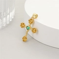Close-up of 14K gold cross pendant with green heart gemstone and rose petal details - Gold Rose Green Gem