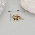Macro shot of a 14K gold plated dinosaur pendant with colorful zircons, size 21x16mm - Colorful Zirconia Parasaurolophus Style (H-11326)