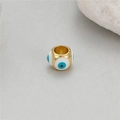 Detail of 14K gold plated evil eye bead with blue enamel for DIY jewelry making - White