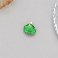 Macro shot of green shell pendant with golden loop and textured stripes for jewelry making - Green (H-12091)