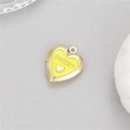 Detail of a 14K gold-plated heart locket with yellow enamel and SWEET engraving - Yellow (H-12093)