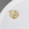 Macro detail of gold plated sun and moon pendant for DIY jewelry necklace accessories - Sun and Moon Round Pendant (K-0426)