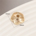 Macro shot of 10mm gold flower bead cap with square grid texture for DIY jewelry making - Golden Grid Flower (H-8469)