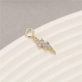 Macro view of gold plated lightning bolt pendant with micro-pave cubic zirconia stones - Lightning Shape (H-8636)