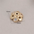 Macro view of 10mm gold flower spacer bead with sparkling zirconia for jewelry making - Six-Petal Center Rhinestone Style (H-8460)