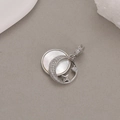 Macro detail of crescent moon and star pendant with white mother of pearl inlay - Palladium Color (H-9308)