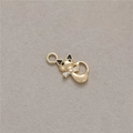 Detailed view of a gold cat charm with zircon bowtie and enamel ears for DIY jewelry - Cat Shape (H-8654)