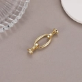 Gros plan sur le connecteur ovale en or poli pour la création de bijoux DIY - Style Ovale Poli (P3869)