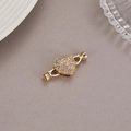 Detailed macro view of heart-shaped gold-plated jewelry clasp set with cubic zirconia stones - 14k Gold P21668