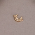Detailed view of a 14K gold plated crescent moon charm with cubic zirconia for DIY jewelry - Crescent Moon Charm Connector (H-9574)