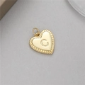 Gold heart-shaped pendant with embossed letter C and radial texture for DIY jewelry - Letter C (H-10514)