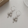 Silver C-shape hoop earrings with metallic triple beads and teardrop pendants in 45-degree view - Palladium H-9655