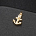 Polished 14K gold plated anchor pendant with sparkling zircon on black leather background - 14K Gold Anchor Style (H-7153)