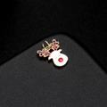 Detail of a Christmas reindeer pendant with gold plating and red crystal antlers - Reindeer Style (H-6956)
