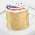 Golden non-fade copper jewelry wire on a white spool for DIY jewelry making - 14K Gold