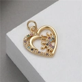 Golden heart pendant with colorful cubic zirconia and sunburst motif on white stone - Colorful Zirconia Starburst Heart (H-7753)