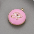 Pink enamel Eye of Horus locket pendant necklace with red zircon in gold plated finish - Pink