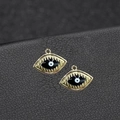 14K gold plated evil eye charm with black and white enamel on black leather background - H-7745