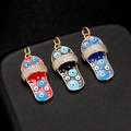 Chic 14K gold slipper charms with evil eye pattern and sparkling cubic zirconia stones - Black (H-6484)