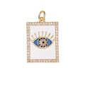 Rectangular gold evil eye pendant with white enamel and blue zircon stones on white background - White