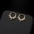 Minimalist gold U-shaped earrings with five hanging loops on black leather background - Gold U-Shaped 5-Loop Style (H-6623)
