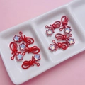 Rode strik bedeltjes met kleurrijke zirkoon sterren voor DIY sleutelhangers - Rood