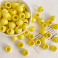Makroaufnahme von 12 mm hellgelben Acryl-Ponyperlen für DIY-Schmuck und Telefonketten - 12mm (6mm Loch) / Gelb